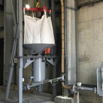 Transfer with an automatic Big bag stand